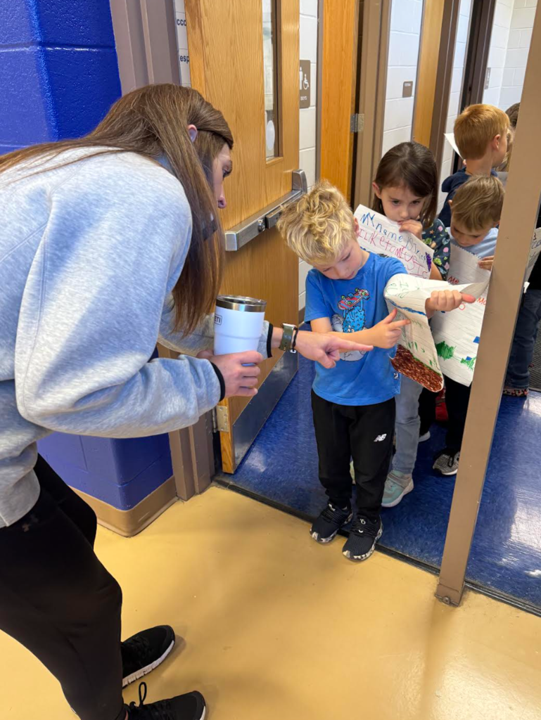 Sharing books with Mrs. Boisseau.