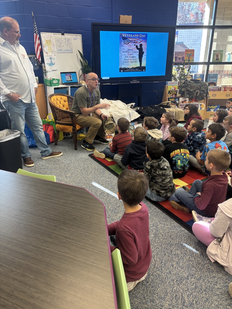 Mr. Meiller and Mr. Fulton speak with students about the Marine Corps.