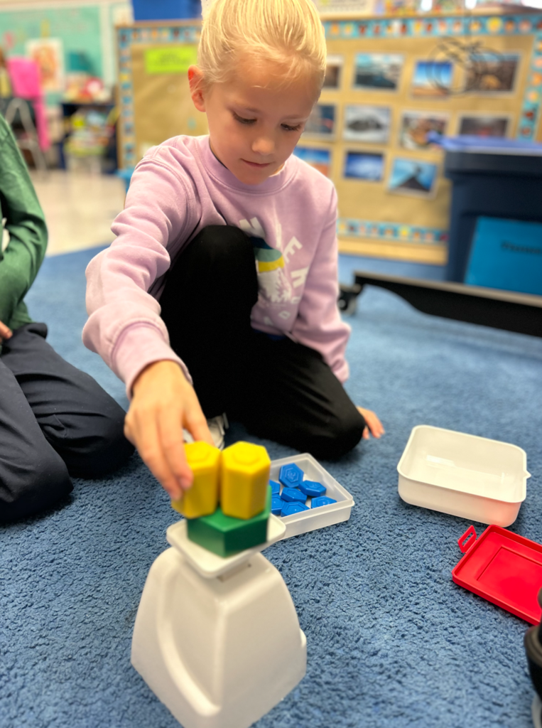 Weighing gram stackers.