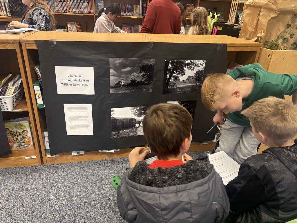 These students are learning through photographs from the past