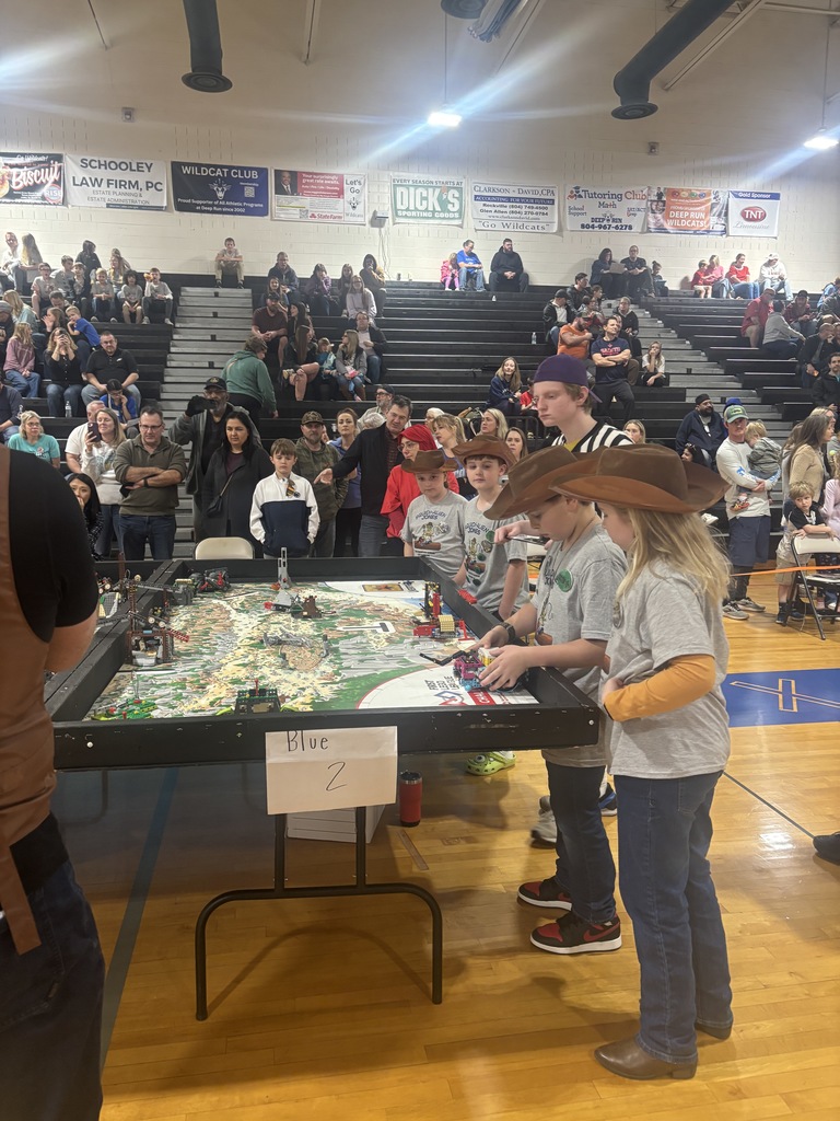 5th graders doing their thing at the robot table!