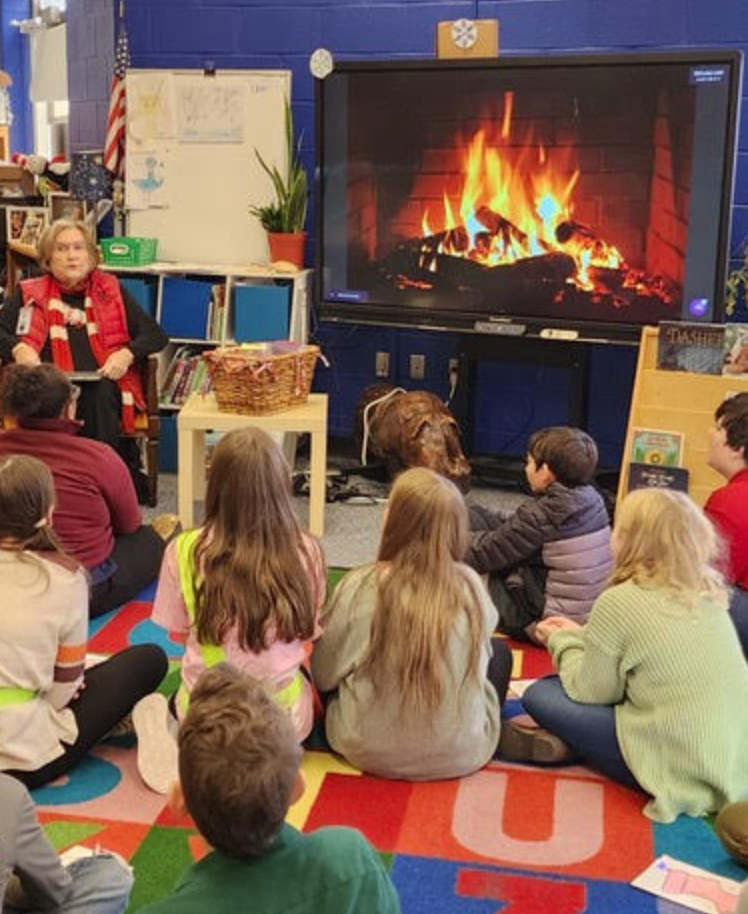 Ms. Robinson reading to 5th grade