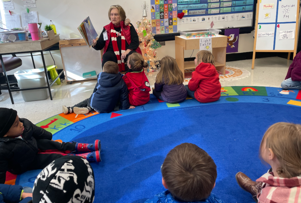 Ms. Robinson reading to preschool.