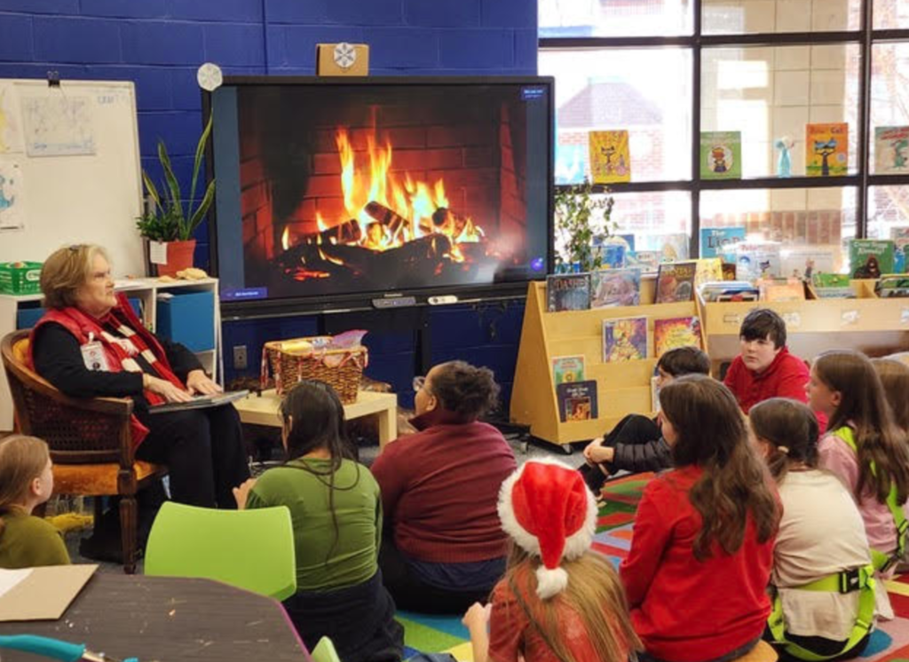 Ms. Robinson reading to fifth grade