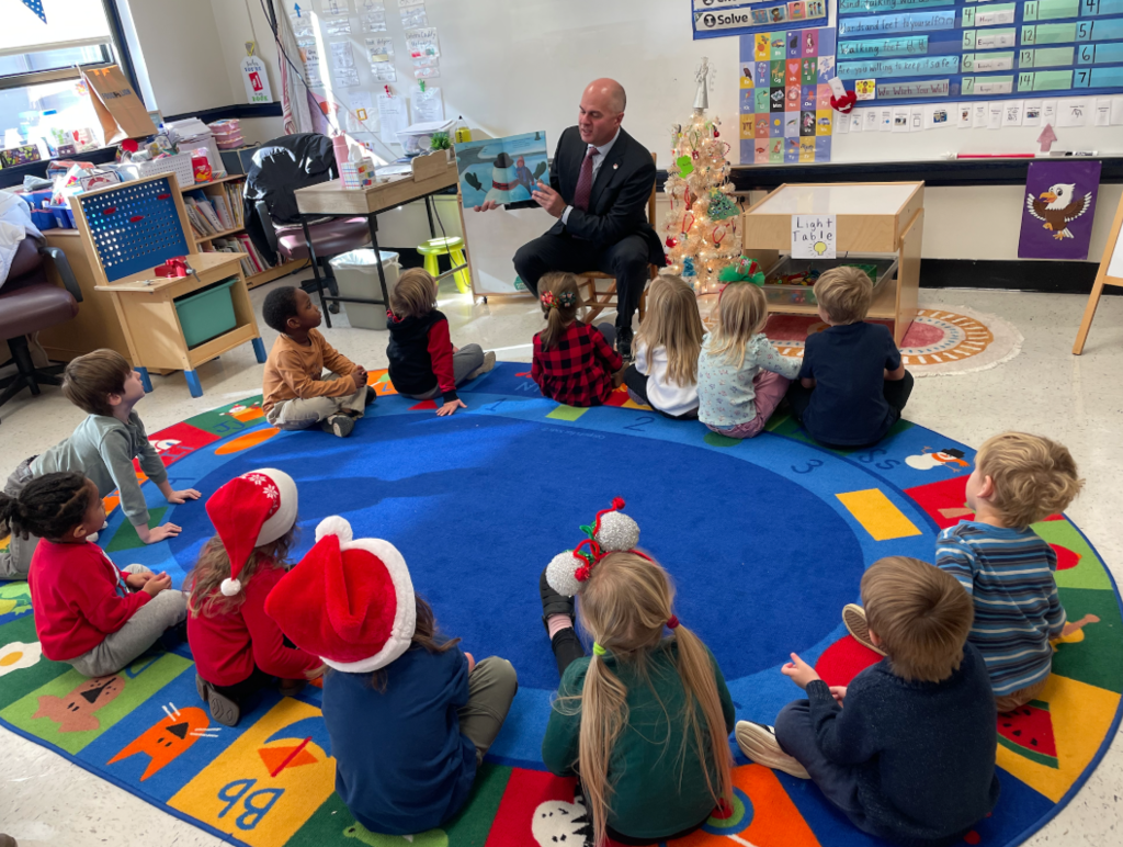 Dr. Armstrong reading to preschool