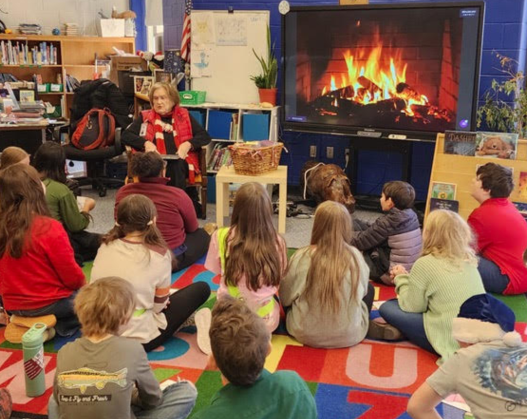 Ms. Robinson reading to 5th grade