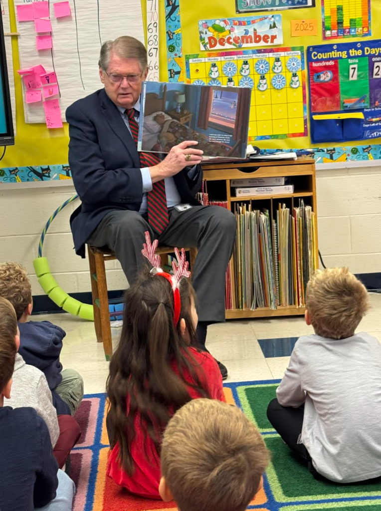 Mr. Watson reading to kindergarten