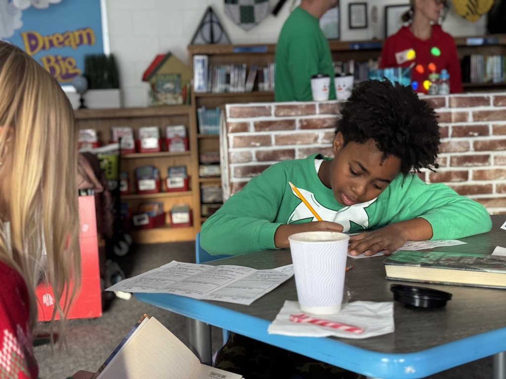 Students reading books and taking notes
