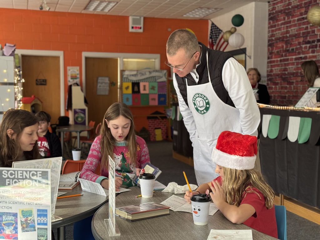 Dr. Geyer checking in with students about the books that they’re reading 