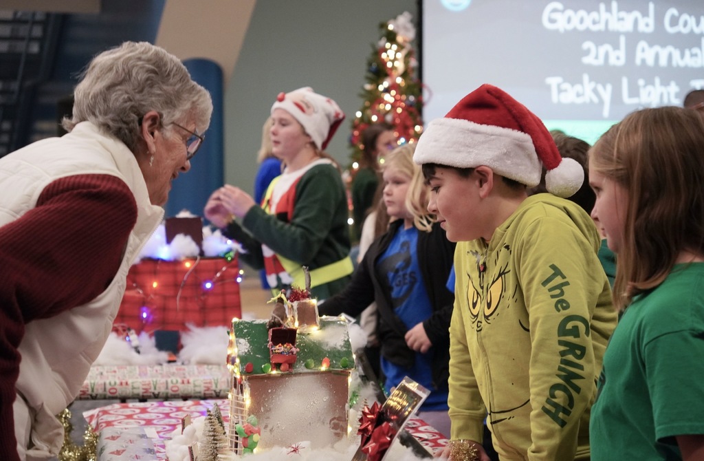 Two students explaining their project 