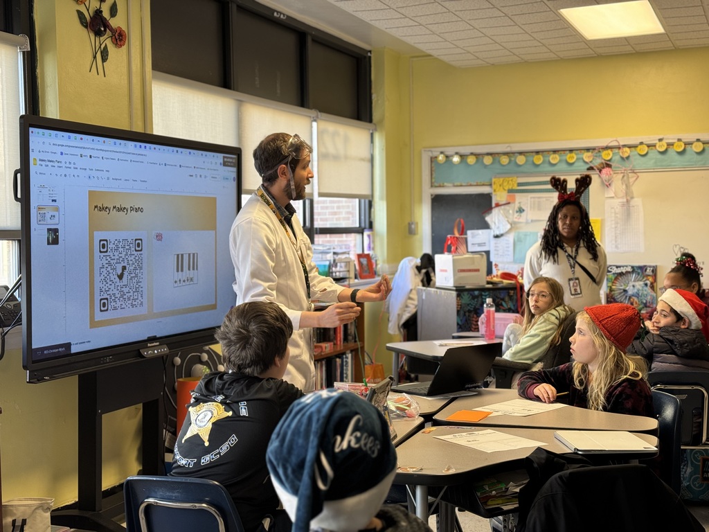 Mr. Mock explaining how the Makey Makeys work