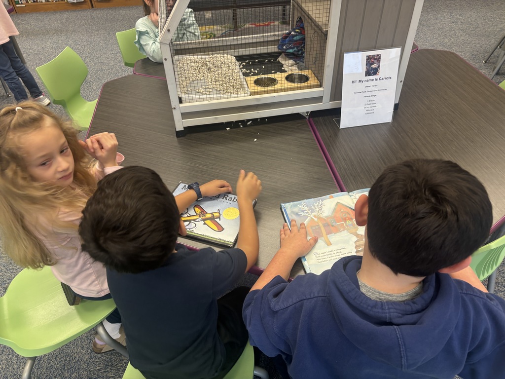 Students especially love to read to her.