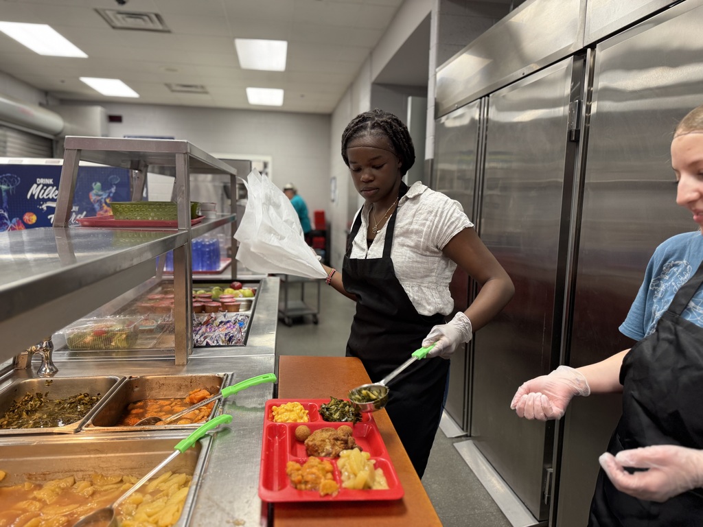 Student serving food