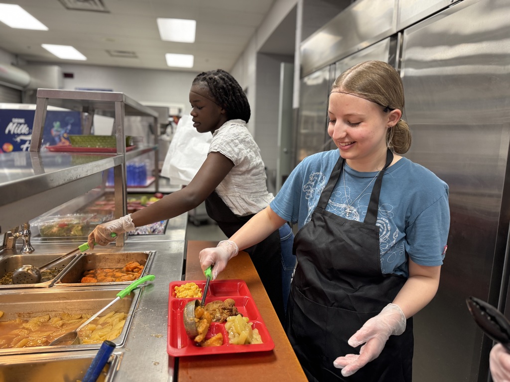 Student serving food