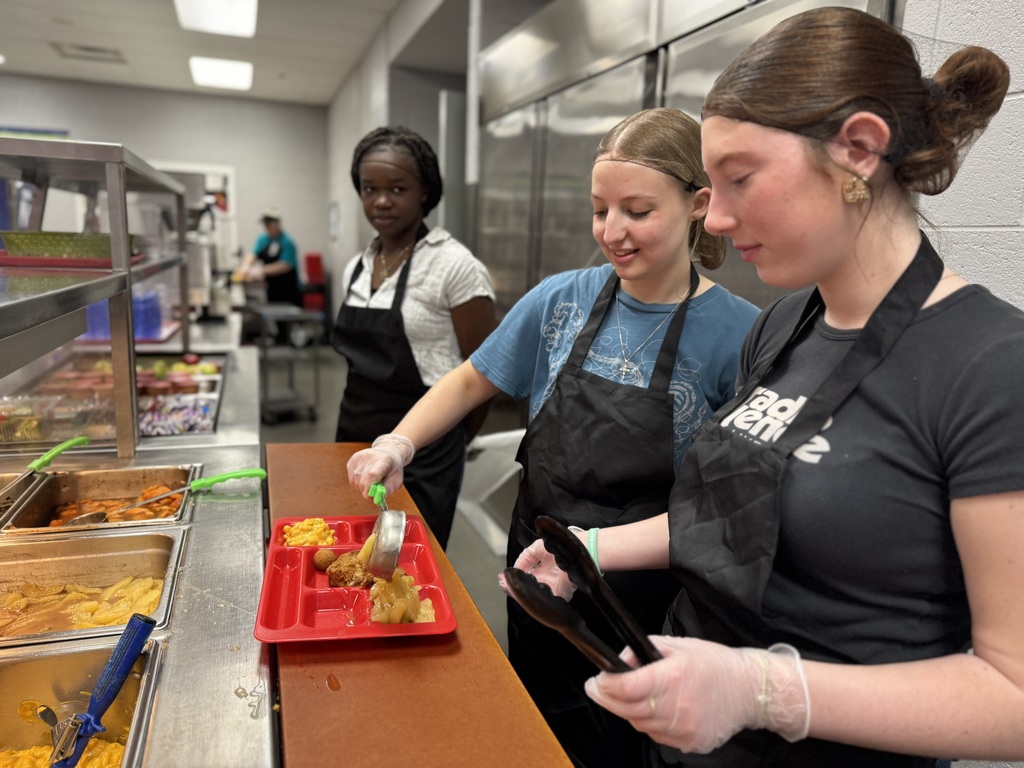 Student serving food