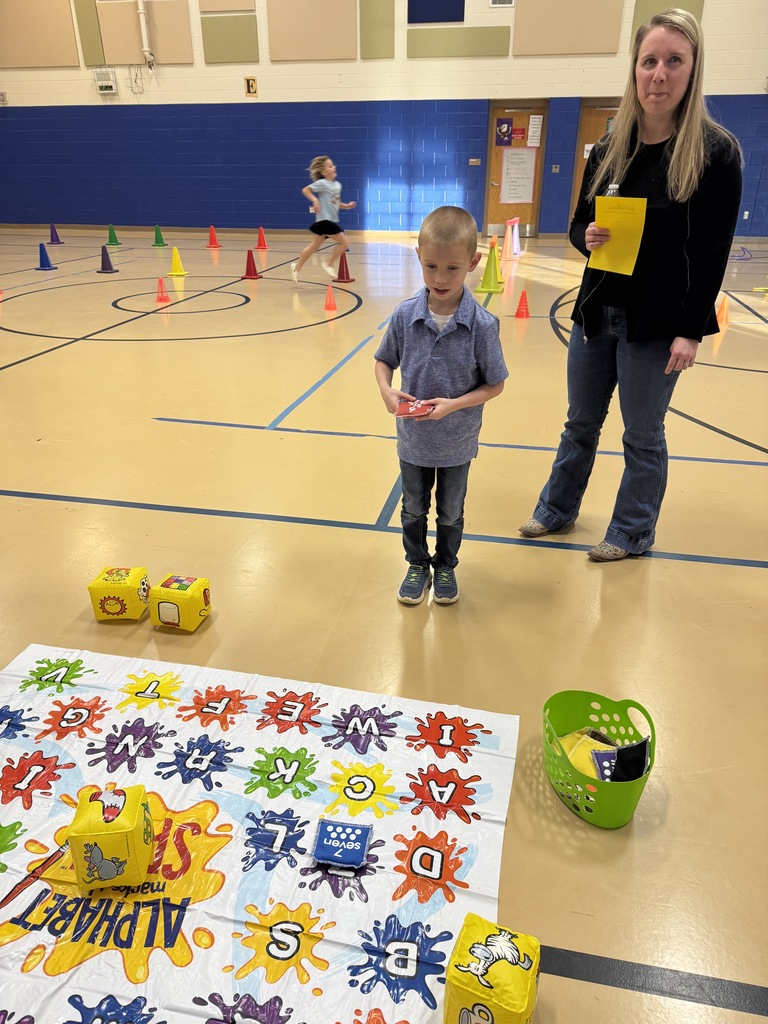 Students enjoyed many fun literacy games set up in  the gym.