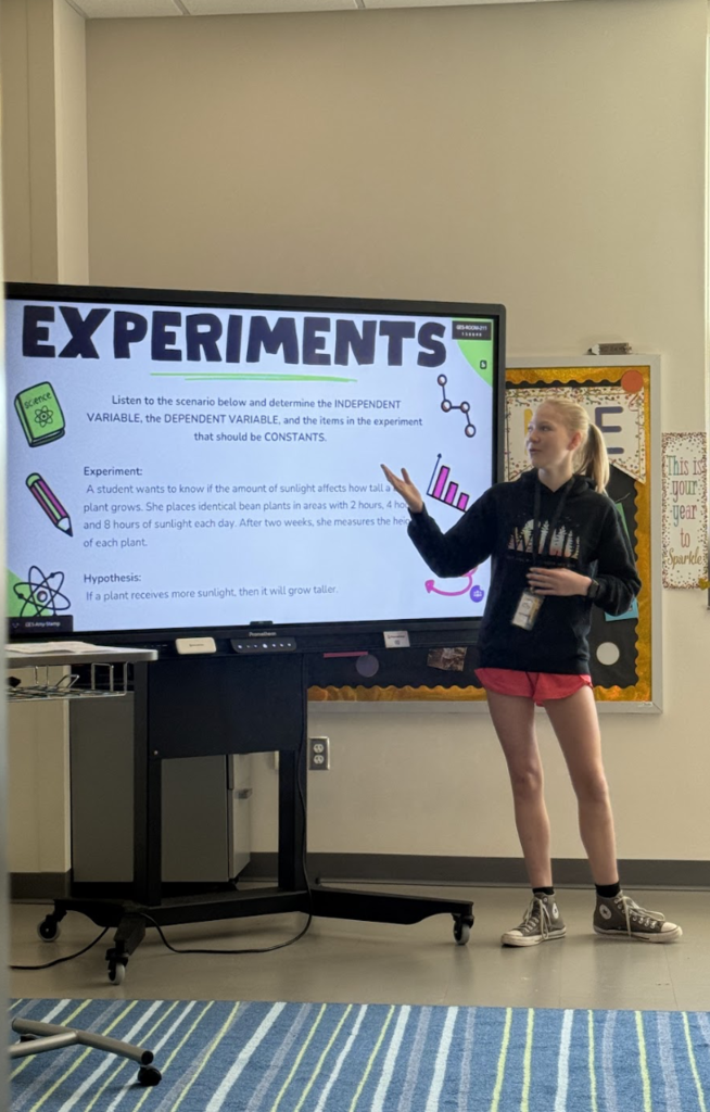 Girl in front of panel
