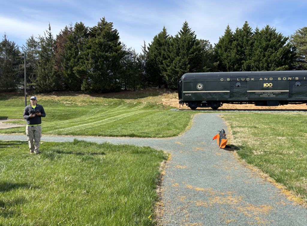 Drone operator and orange drone