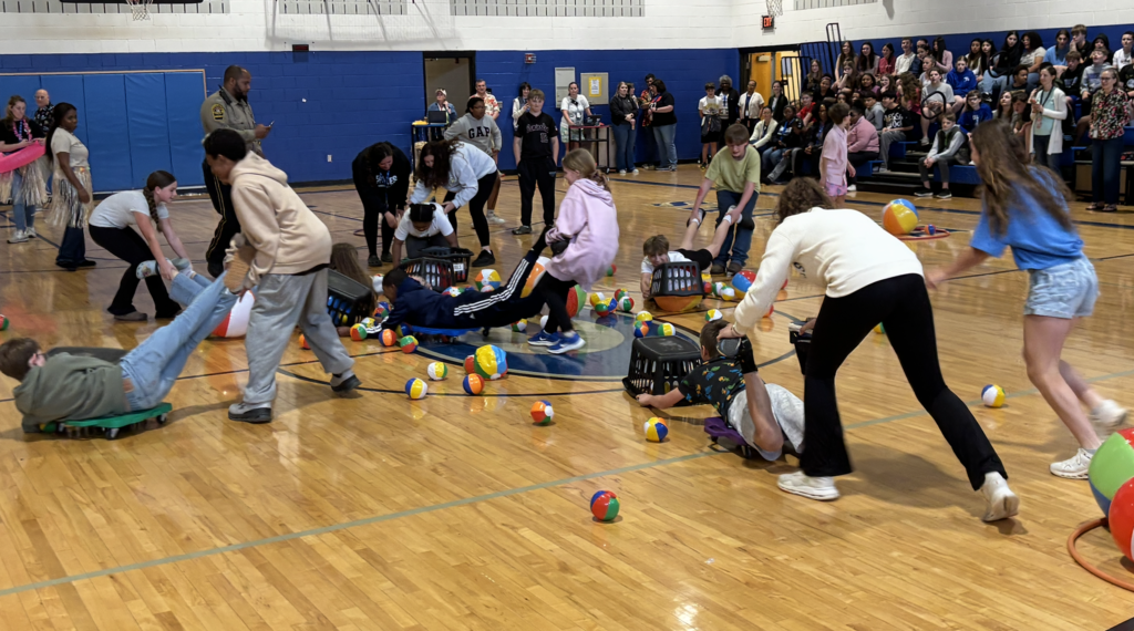 Students playing Hungry Hippos game