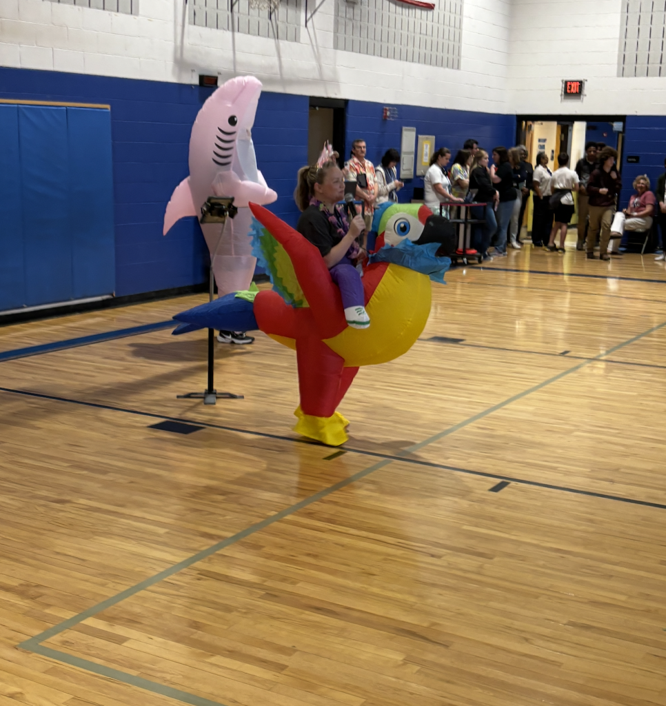 Ms. Blackley in an inflatable parrot costume