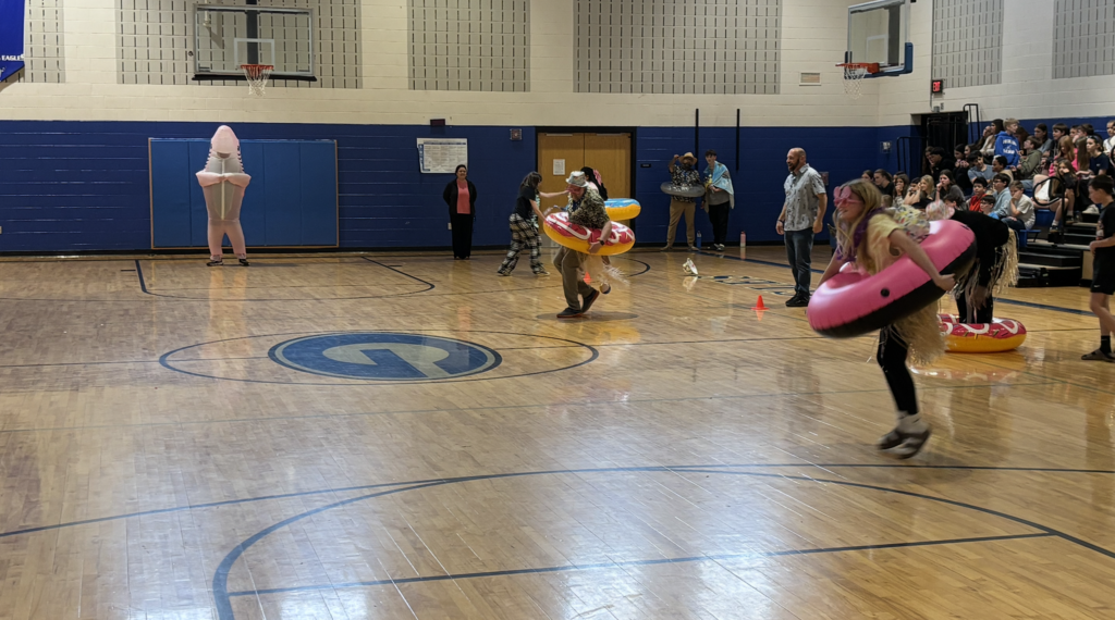 Students playing a game in the gym