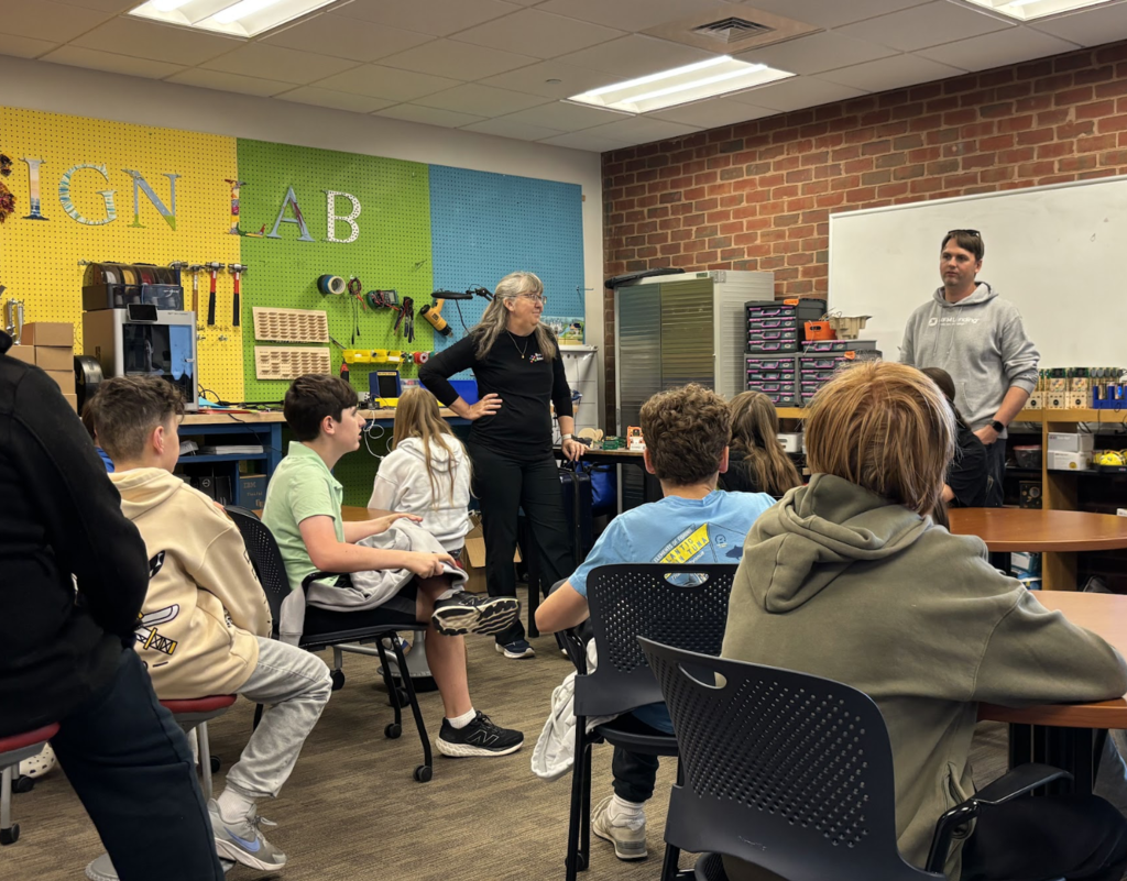 Students listening to Mr. Beasley and Dr. Wilkens speak