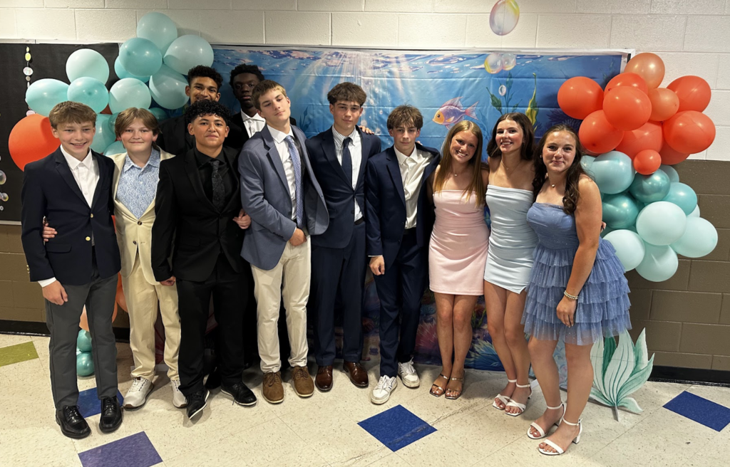 Group of 8th grade students dressed up formally