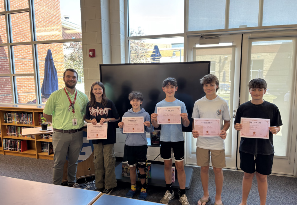 Mr. Tate with the finalists