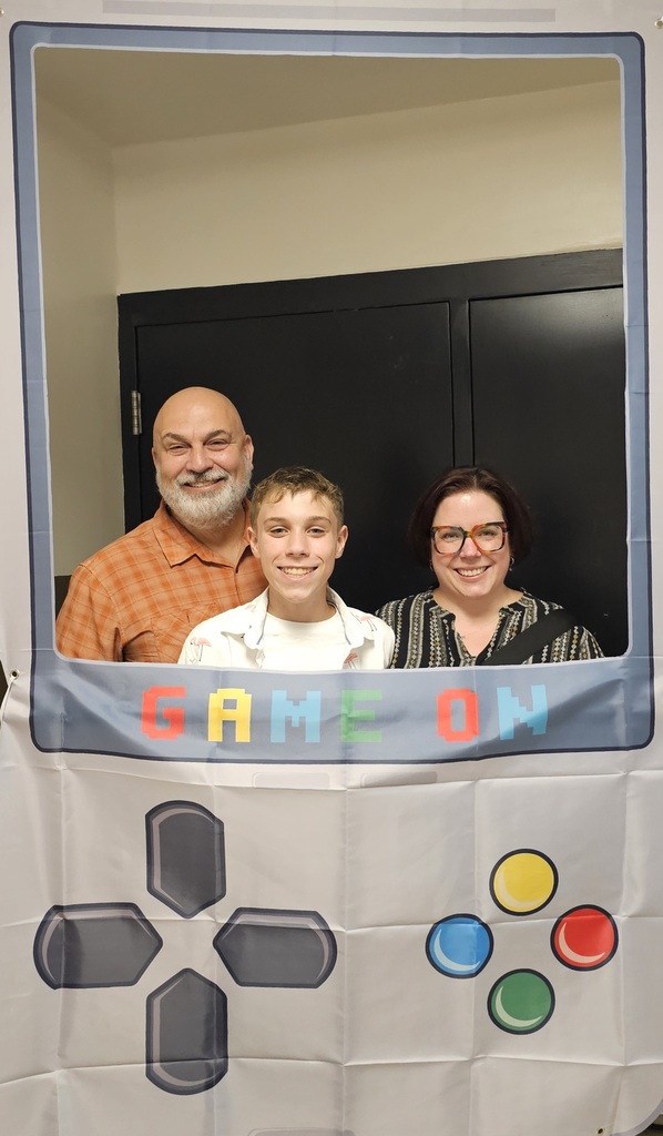 Family at the Game On photo booth