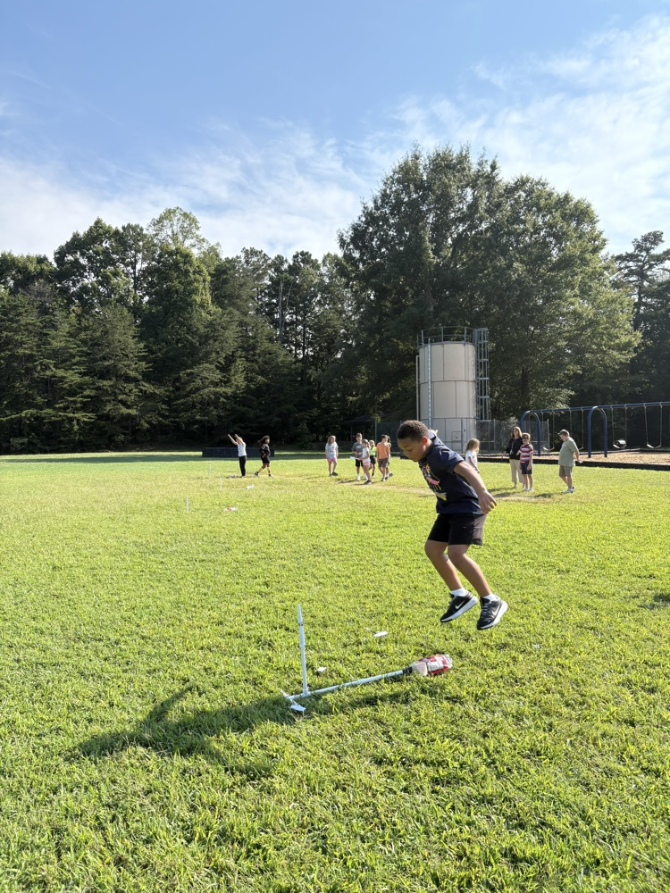 student sending their rocket sky high
