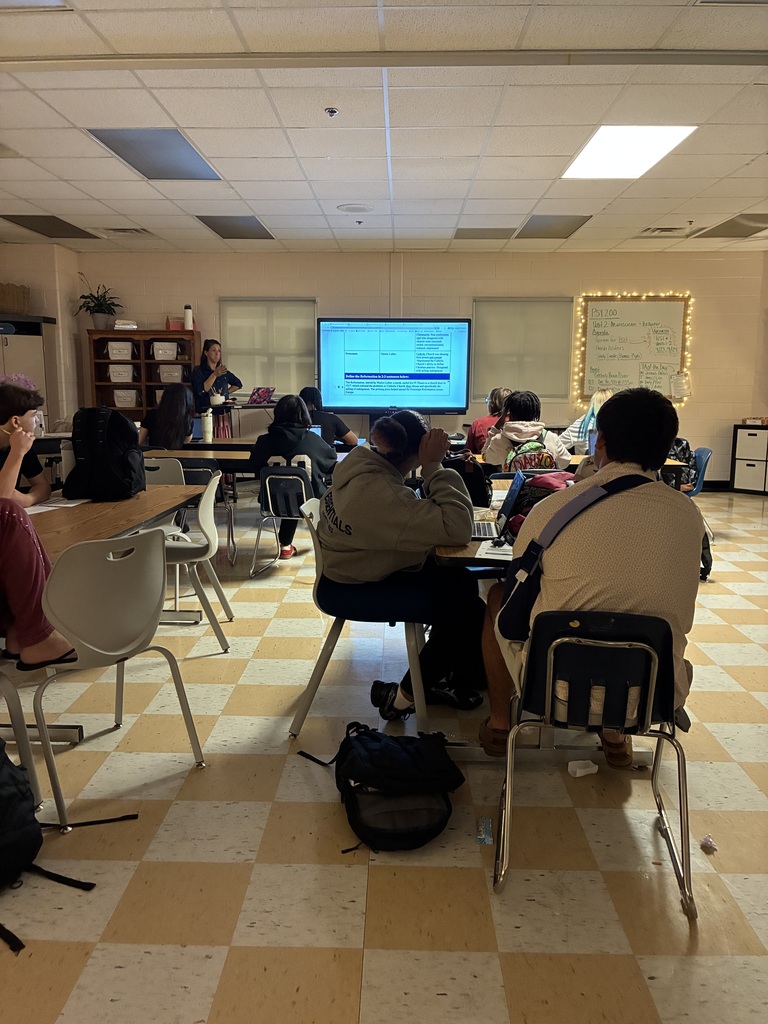 Students taking notes