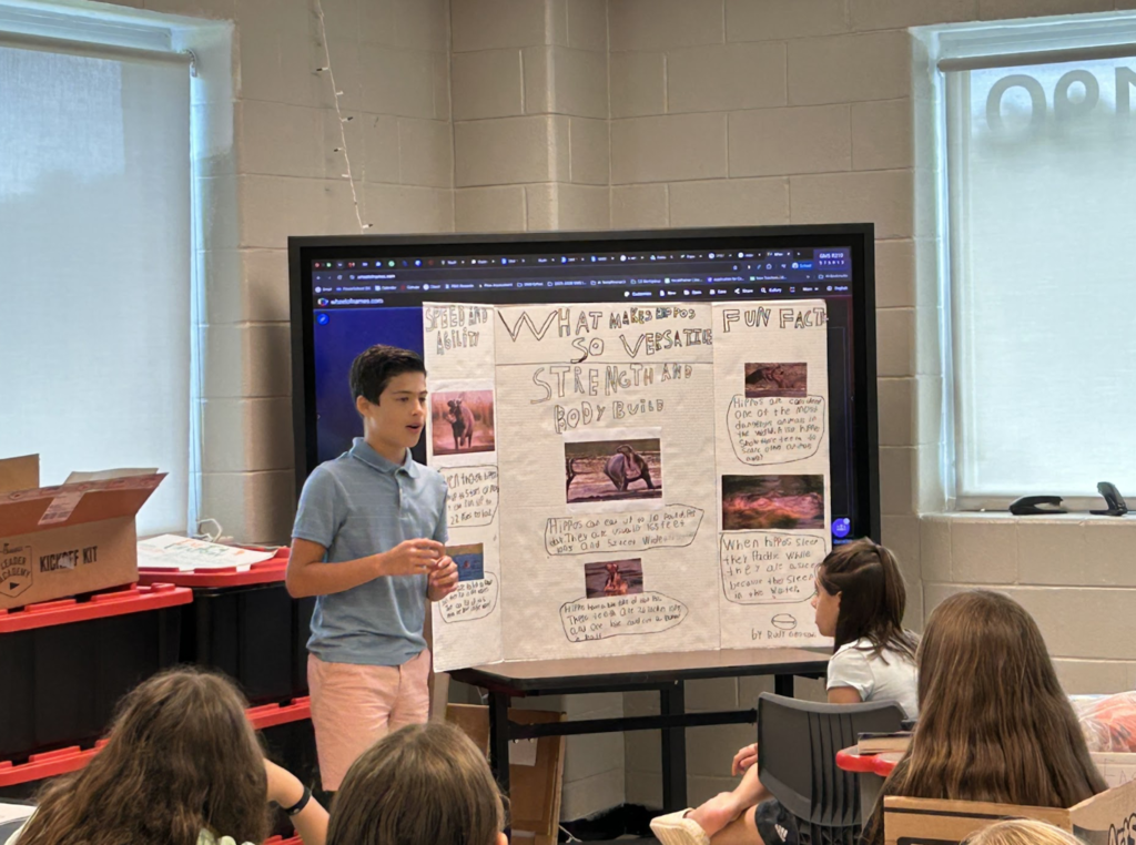 Student presenting their trifold