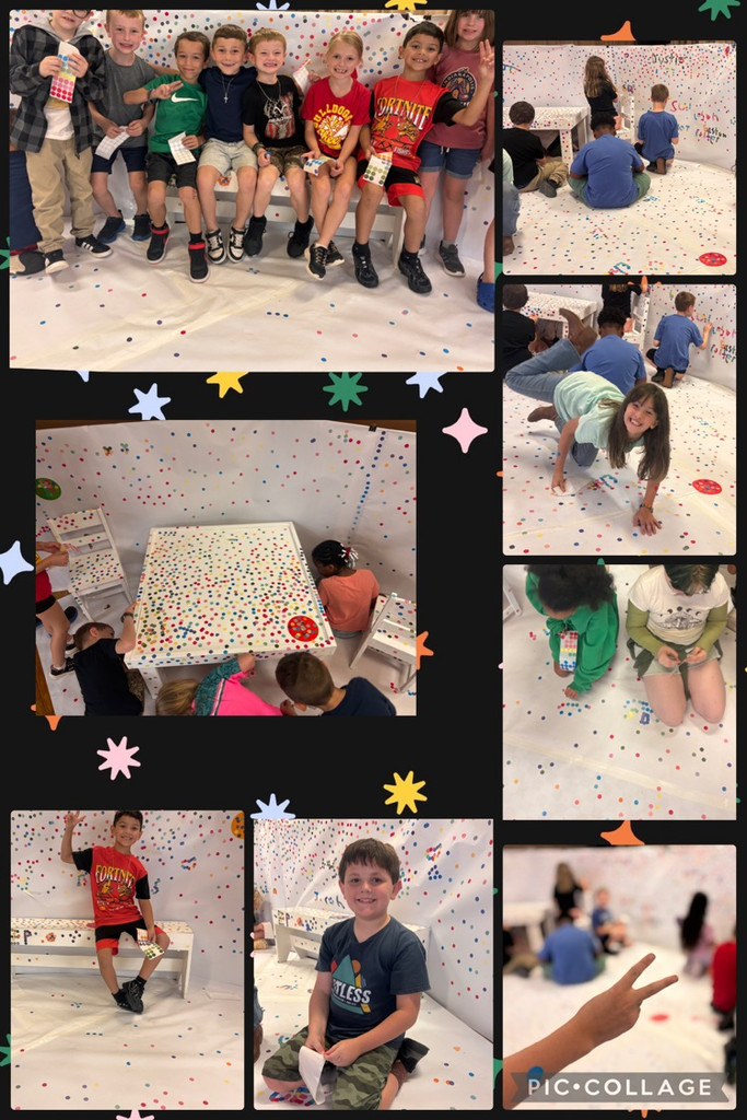 students adding to the Dot Room art project