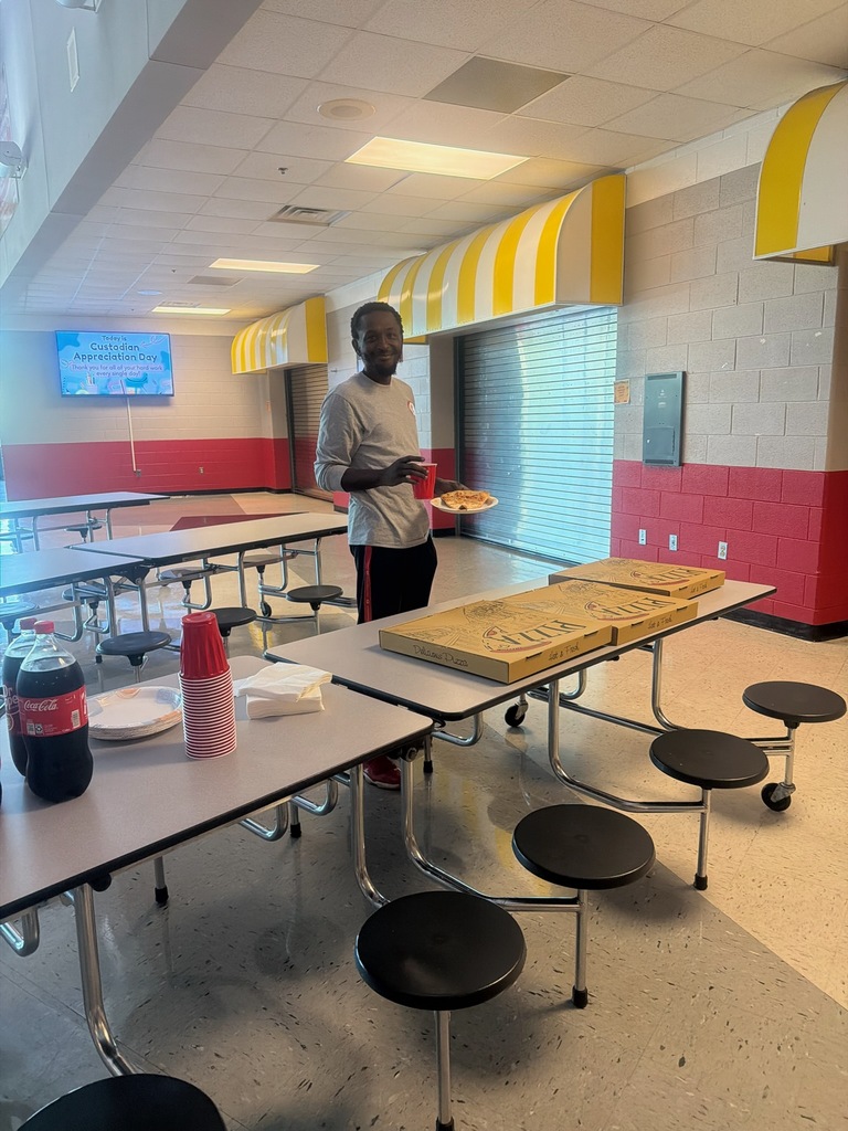 Custodian picking up pizza