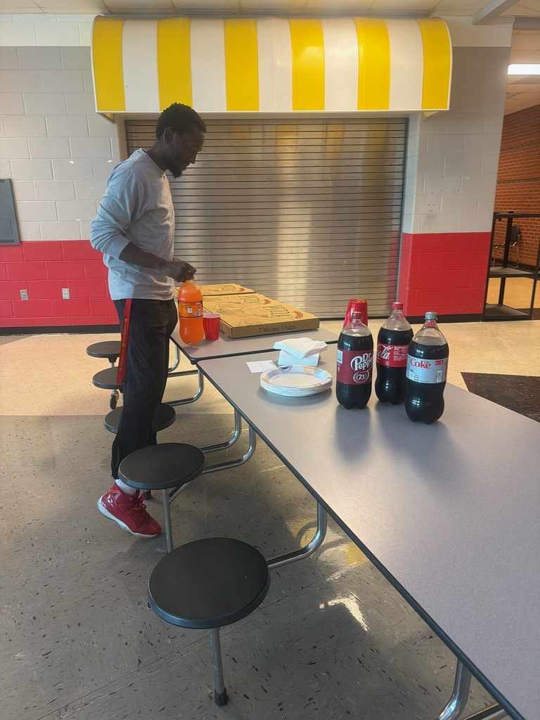 Custodian pouring drink
