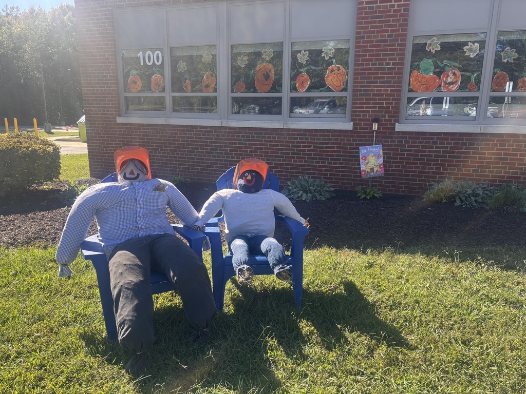 Scarecrows made with hay from Southern States