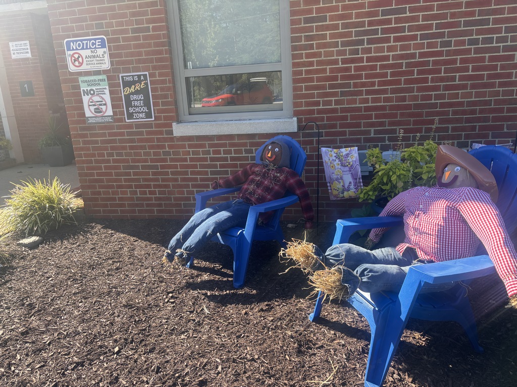 Scarecrows made with hay from Southern States