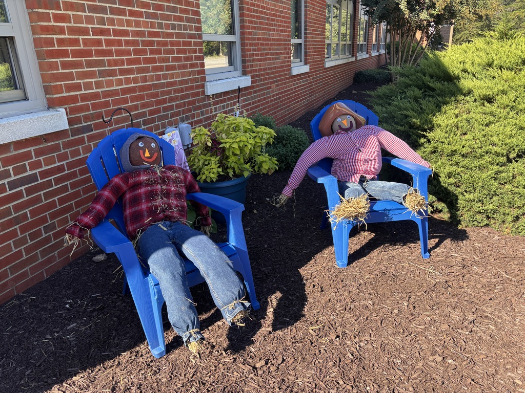 Scarecrows made with hay from Southern States