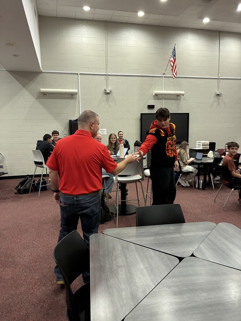 Hahn handing out ticket