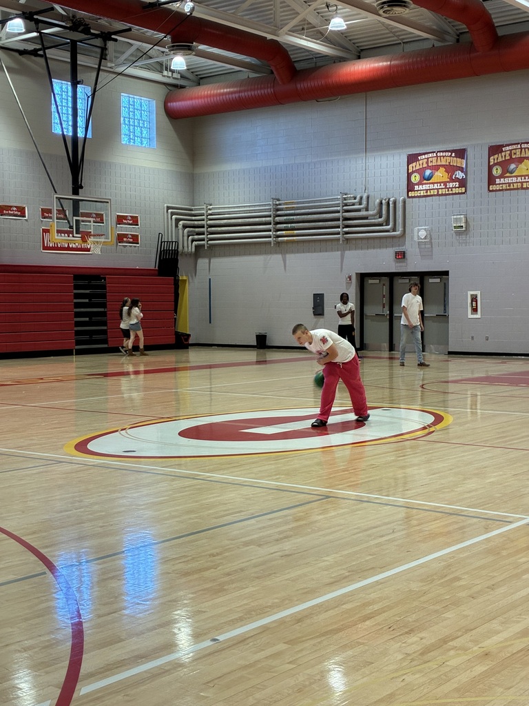 Student rolling the ball