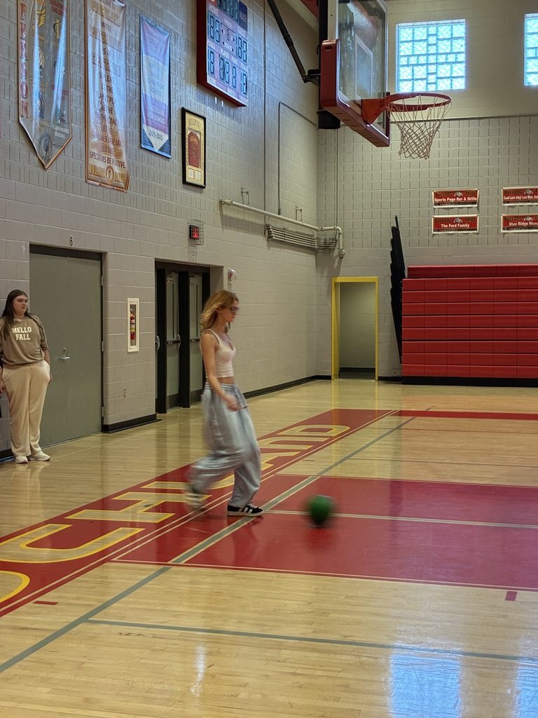 Student kicking the ball