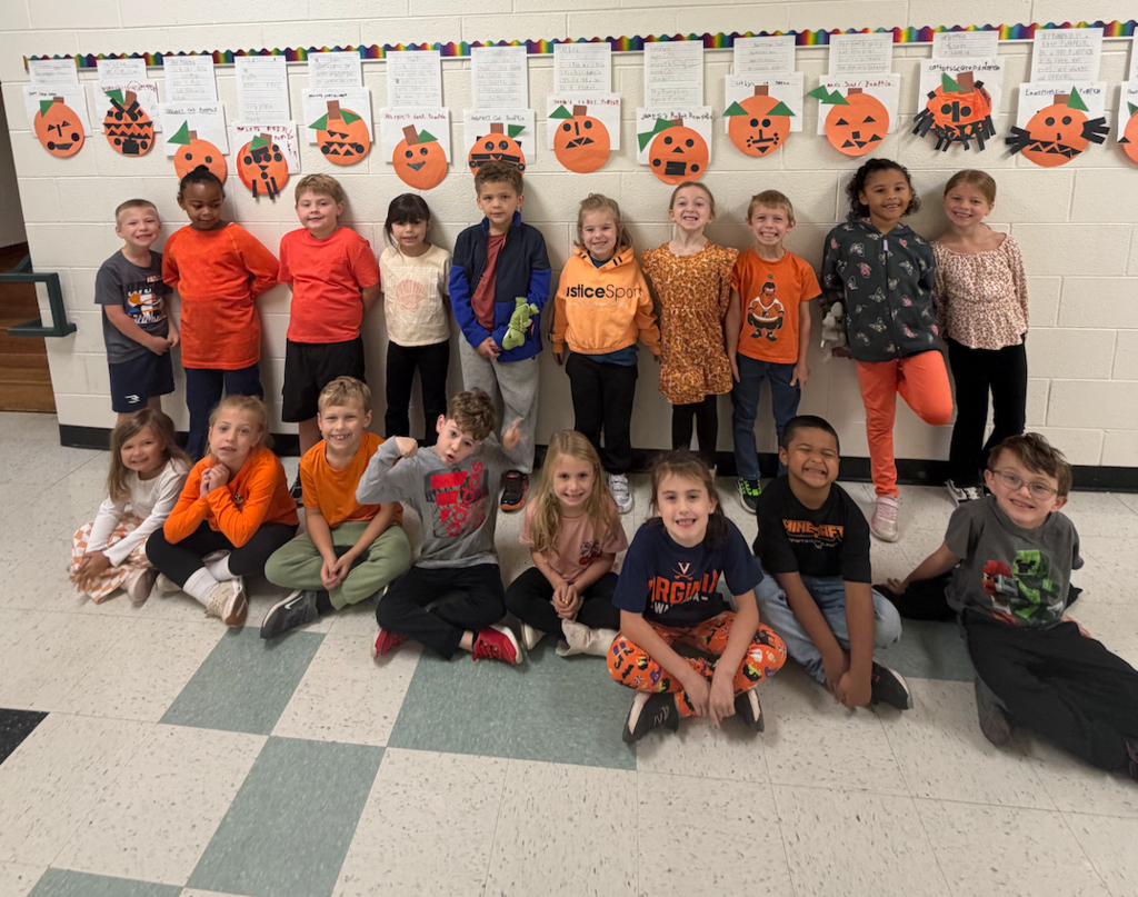 A class wearing orange for Unity Day.