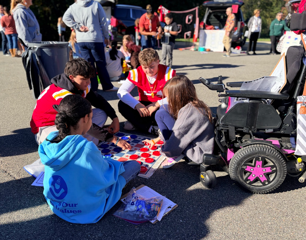 Students working on a game together