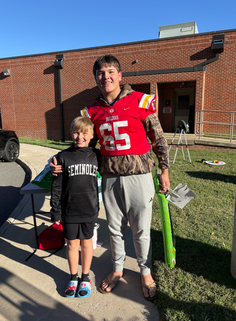 A high schools student and his brother