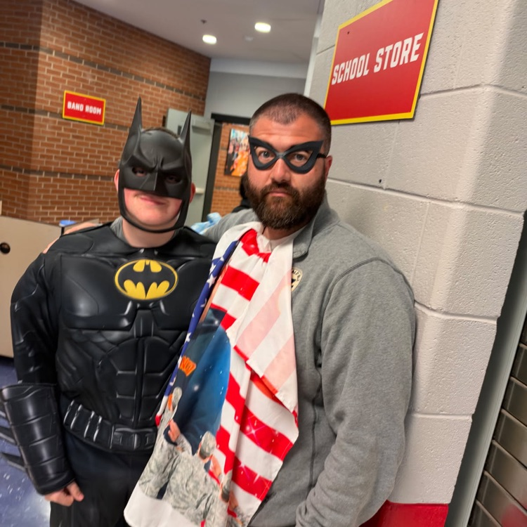 two people dressed up as villains