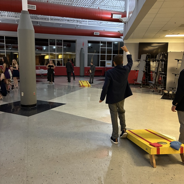 students playing cornhole 