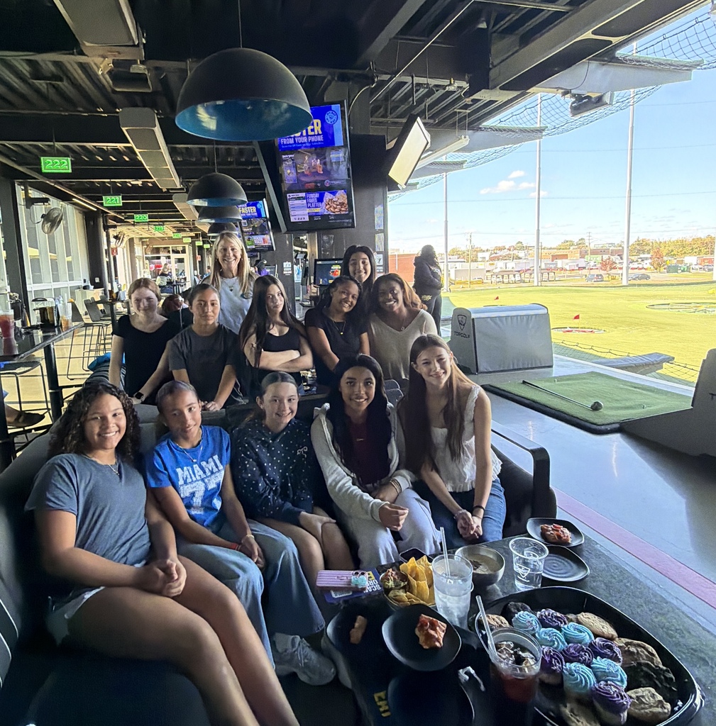 Girls2Women group photo at Top Golf