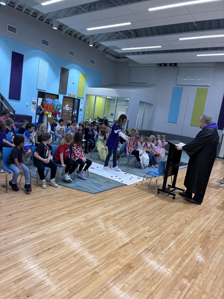 Q and U walking down the isle