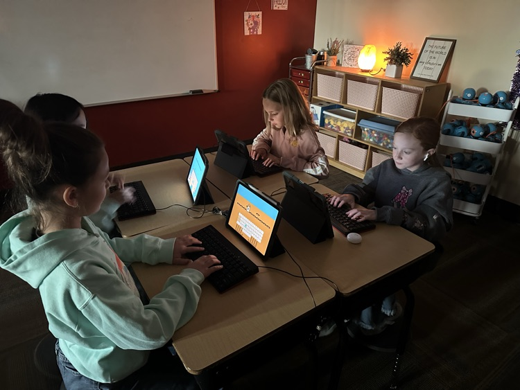 Students are working hard on their keyboarding skills!