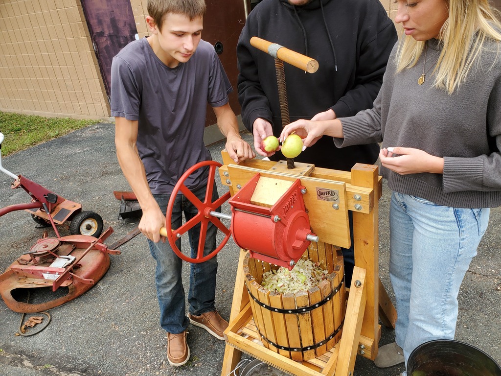 Students chopping the apples